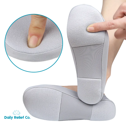 Gray  foot pain plantar relief socks , labeled 'Daily Relief Co.'